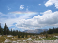 Rainbow clouds over a high meadow