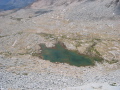 Lake and tent (the tiny blue speck) at the foot of the pass