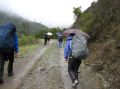 Covering up from the rain as we head in