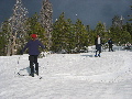 Bill and Ksenia watch Steve S. carve a turn